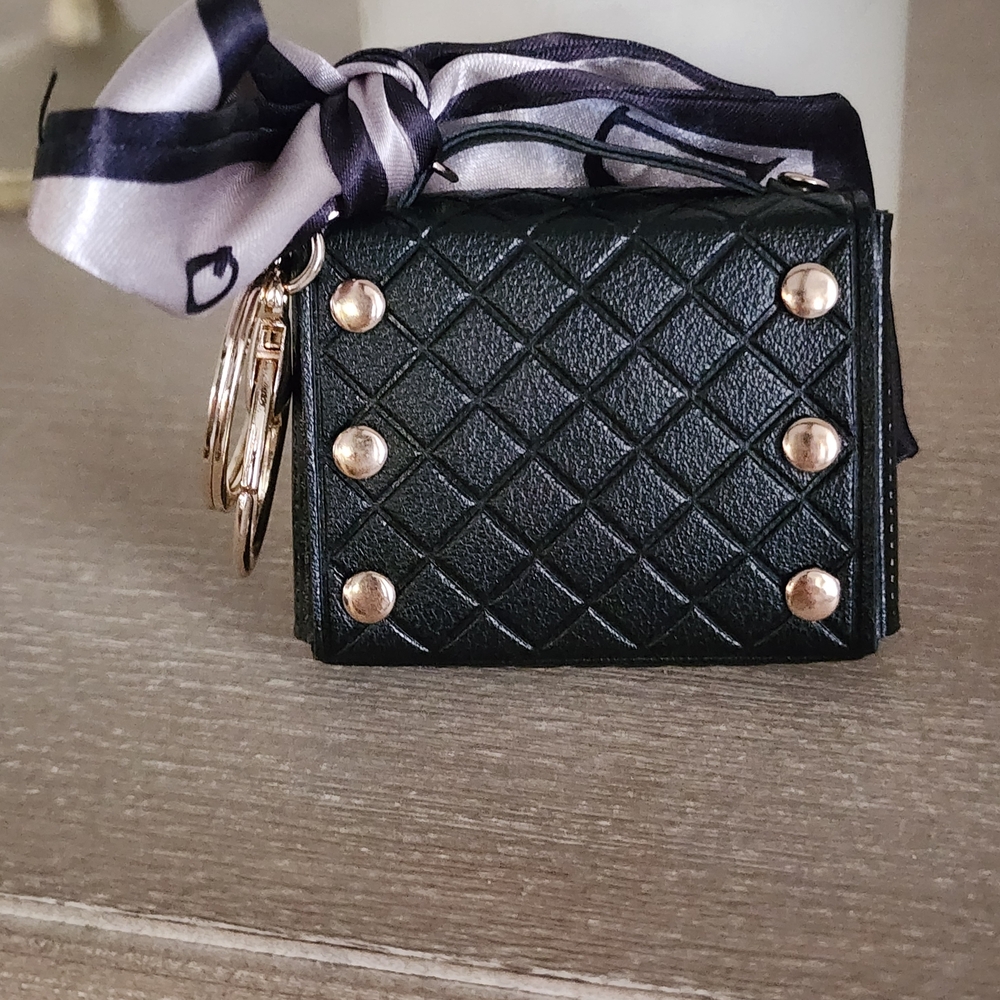 Elegant Black Quilted Mini Bag with Gold Accents - Picture 2 of 3